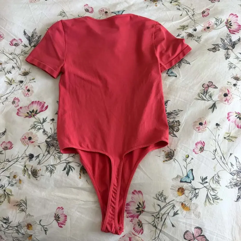 Free People Bodysuit Size M/L Red Short Sleeve Round Neck Nylon Blend